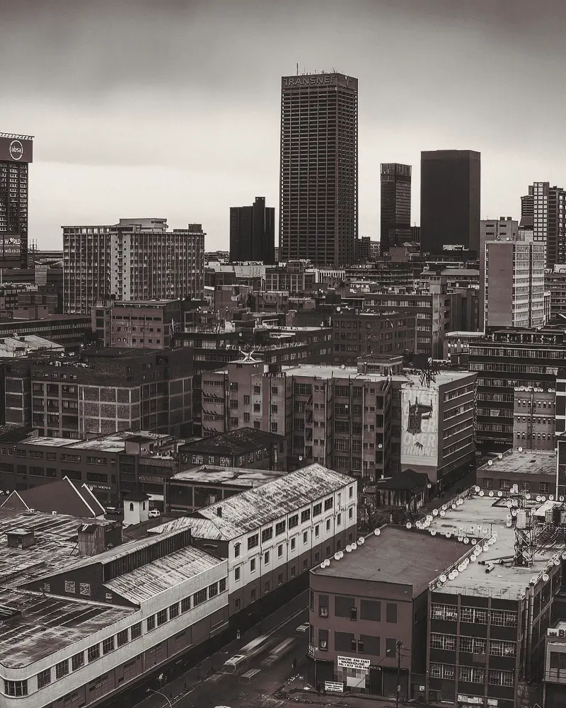 Johannesburg skyline at golden hour, seen from above.
